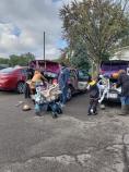 Kramer Homes Halloween party families loading their cars with Halloween decorations