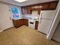 Kitchen with appliances at Kramer Homes