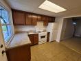Kitchen with appliances at Kramer Homes